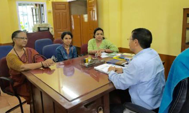 Mythili with the Principal of Kamrup Academy Higher Secondary School